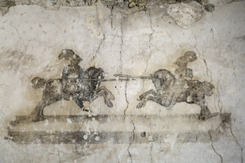 Wandmalerei mit zwei Rittern bei einem Turnier